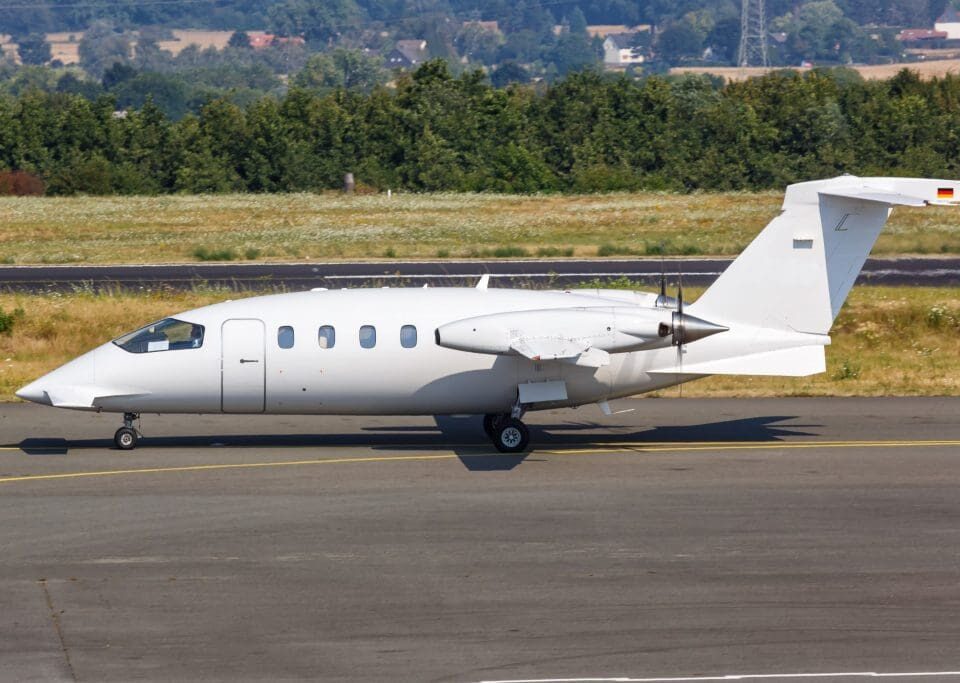 Piaggio Avanti II parked on airport taxiway