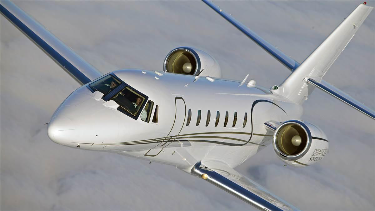 Citation Sovereign flying above the clouds