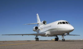 Falcon 900 interior showing wood-paneled galley area