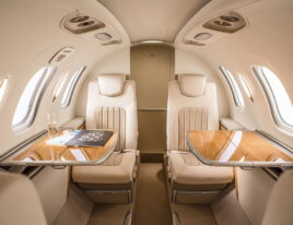 HondaJet Elite interior with leather club seats and fold-out tables