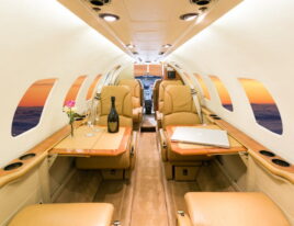 Citation Ultra jet cabin with leather seating and fold-out tables