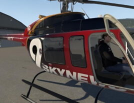 1999 Bell 407 helicopter with pilot seated in open cockpit