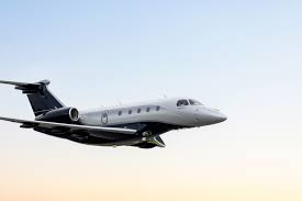 Embraer Praetor 500 super-midsize business jet in flight during climb
