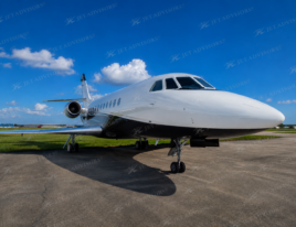 2002 Dassault Falcon 2000 business jet shown from a front three-quarter angle while parked on an airport ramp.